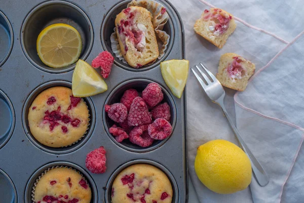 Top View Vanilla Raspberry Muffins Lemon Marble Table — Foto Stock