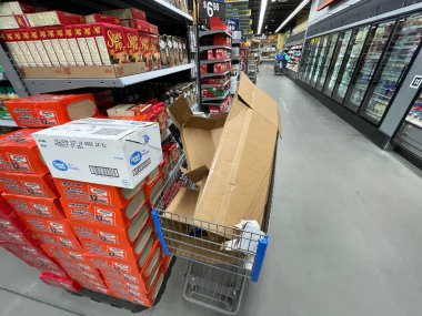 Augusta, Ga USA - 11 28 21: Walmart grocery store interior waste in a shopping cart