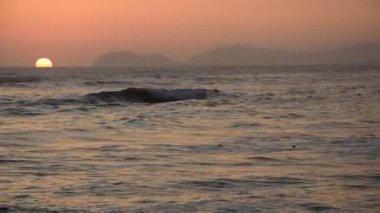 View of  the coastline and  at sunset in Lima, Peru