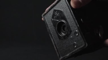 A close-up of a vintage photo camera, Agfa Box 44 in slow motion