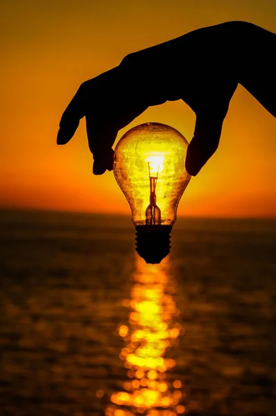 Energy Concept Light Bulb Sun Setting Atlantic Ocean — Stock Photo, Image