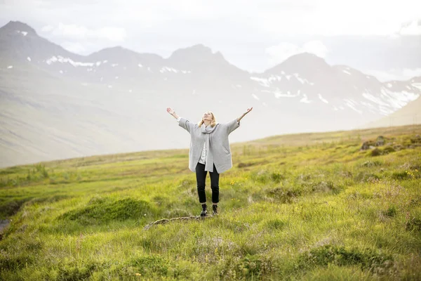 Young Female Raised Hands Green Field Djupivogur Iceland — Stock Photo, Image