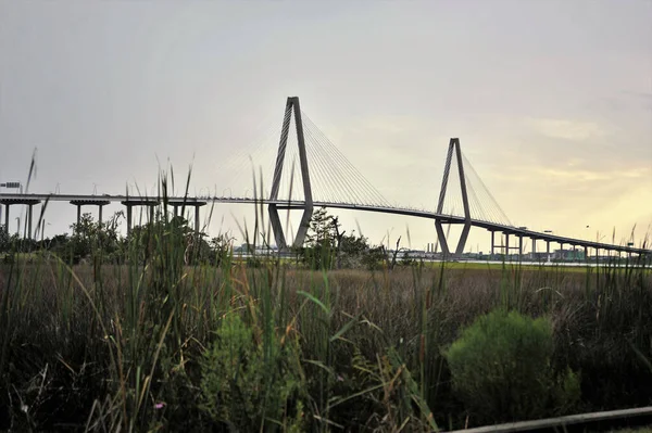 A beautiful shot of Arthur Ravenel Jr. Bridge against dusk sky in Charleston, South Carolina, United States