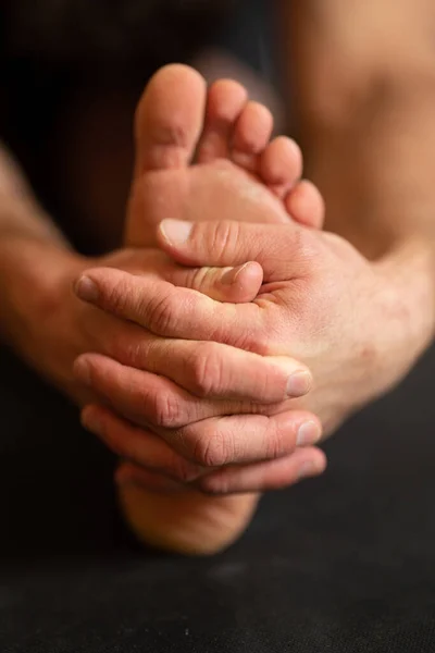 Closeup Yoga Exercise Hand Holding Foot — Stock Photo, Image