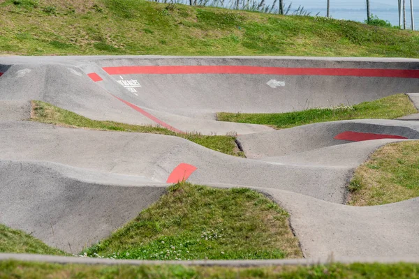 The Pump Track sports track through bumps and curves in Parque das Nacoes, Lisbon