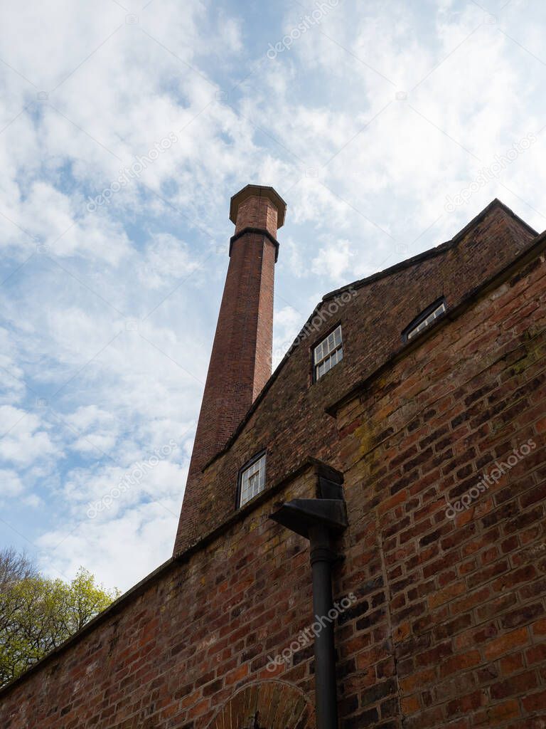 Styal Cheshire UK April 17, 2022 The mill at Quarry bank and chimney