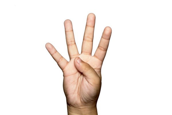 A closeup of a boy raising four fingers up on white background