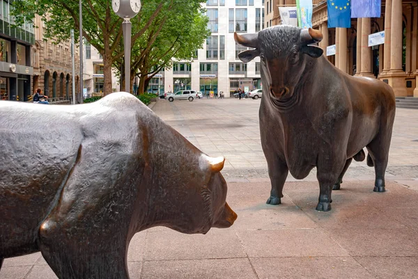 A Metal bear and bull statues in the park in front of Frankfurt stock exchange