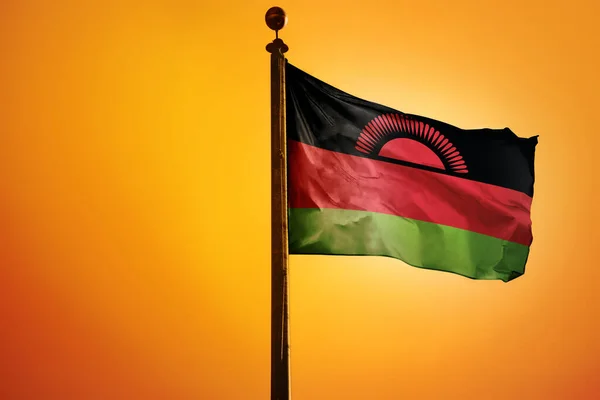 Nationale Vlag Van Malawi Een Vlaggenmast Geïsoleerd Een Oranje Achtergrond — Stockfoto