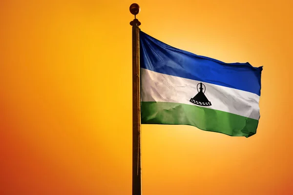Bandera Nacional Lesotho Sobre Asta Bandera Aislada Sobre Fondo Naranja —  Fotos de Stock