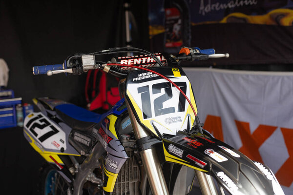 A closeup shot of a motorcycle on the motocross