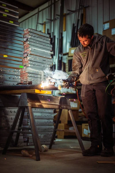 Vertical Shot Male Using Cutting Torch Bright Flame Casts Shadows — Stock Photo, Image