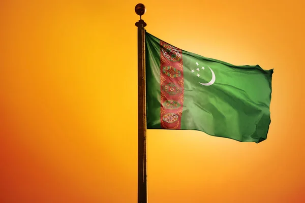 Återgivning Viftande Flagga Turkmenistan Pol Orange Bakgrund — Stockfoto