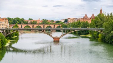 Montauban, beautiful french city in the South, old bridges on the river Tarn clipart
