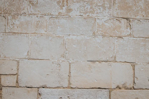 Bej Rengi Eski Yıpranmış Bir Duvarın Yakın Çekimi — Stok fotoğraf