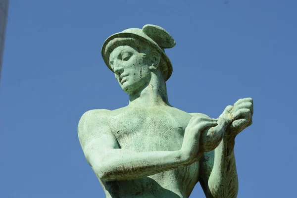 Sculpture of the ancient greek god Hermes, also known as the Roman god Mercury, the God of trade, merchants, Shepherds and travelers.