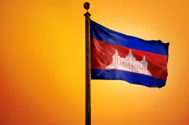Kamboçya bayrağının dijital bir çizimi. Parlak sarı bir gökyüzüne doğru sallanıyor.