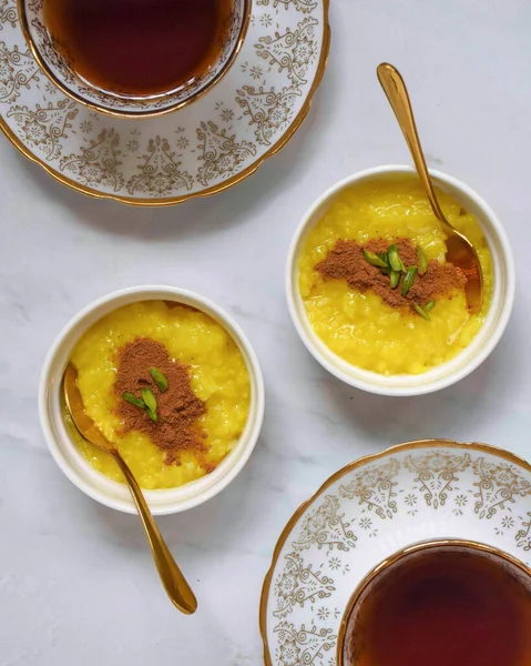 Two Portions Saffron Rice Pudding Served Cinnamon Tea — Stock Photo, Image