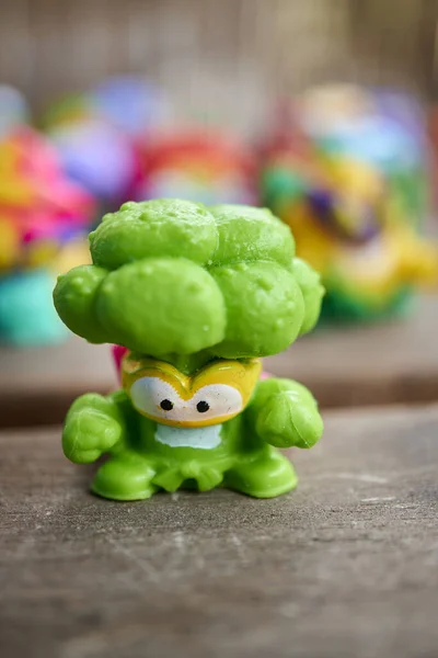 A Magic Box brand Super Thing broccoli-shaped toy figurine of the hero team