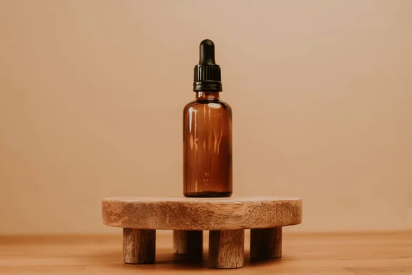 Cosmetic Serum Wooden Stand Isolated Beige Background — Stock Photo, Image