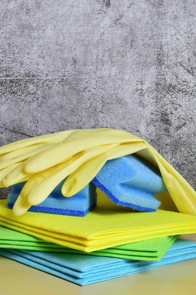 A vertical shot of household cleaning products with a background with copy space