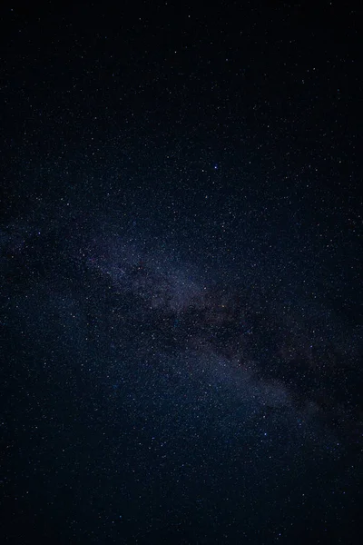 Vertikální Záběr Noční Oblohy Plné Hvězd — Stock fotografie