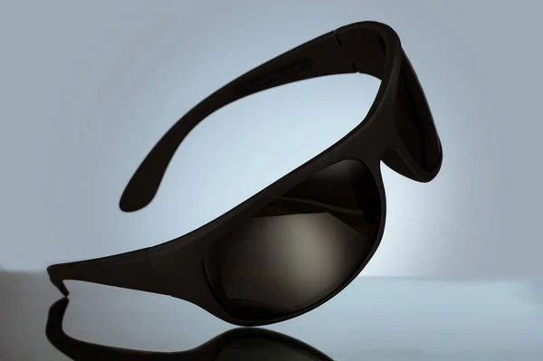 Egy Illusztráció Fekete Napszemüveg Elszigetelt Világoskék Háttér — Stock Fotó