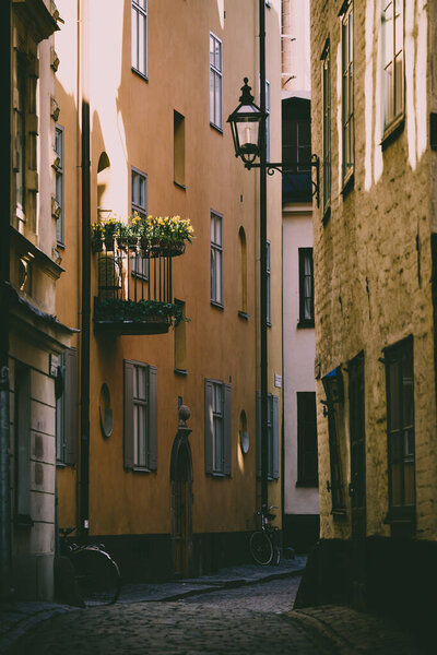 A narrow street surrounded by buildings in Stockholm
