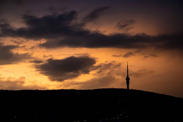 Orange Cloudy Sunset Tower Silhouette — Stock Photo, Image