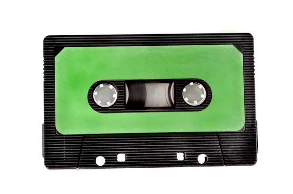 Primer Plano Una Cinta Cassette Con Una Etiqueta Verde Aislada — Foto de Stock