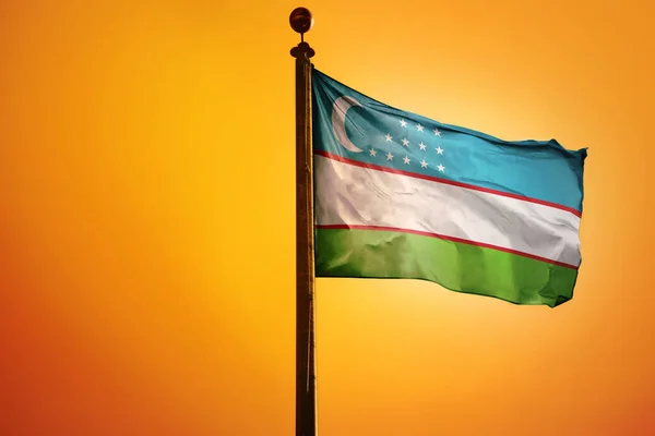 Rendering Uzbekistan Flag Waving Wind Orange Background — Stock Photo, Image