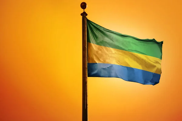 Een Digitale Illustratie Van Vlag Van Gabon Zwaaiend Tegen Een — Stockfoto