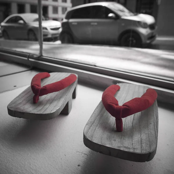Greyscale Shot Pair Wooden Slippers Red Details — Stock Photo, Image