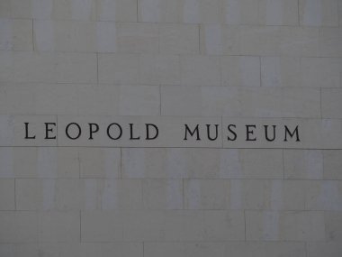 Leopold Museum written in the wall outside of the art museum at the museum quarter in vienna clipart