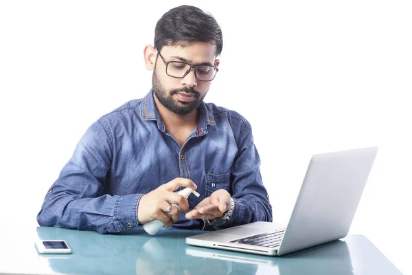 Young Corporate Man Sanitizing Hands Using Laptop — Stock Photo, Image