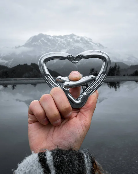 Vertical Shot Two Carabiners Making Heart Shape Scenic Landscape Background — Stock Photo, Image