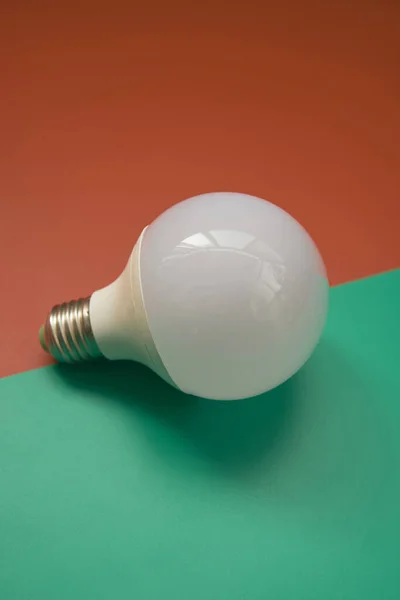 A vertical closeup shot of a light bulb