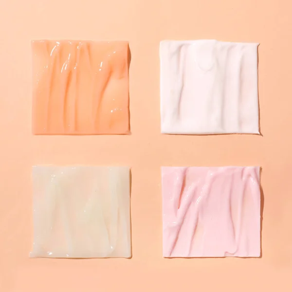 Top View Four Pastel Colored Square Skincare Texture Swatches Pink — Stock Photo, Image