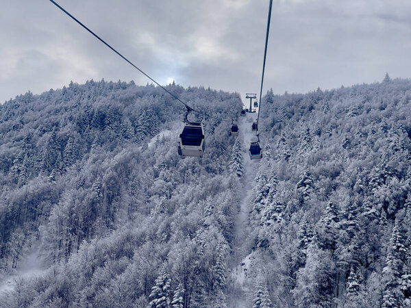 The ropeway between Bursa city center and Uludag Mountain Ski Centre on a snowy mountain in Turkey