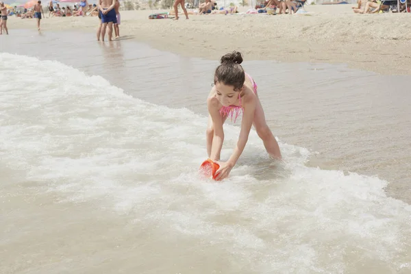 Girl Pink Bikini Playing Happily Shore Beach Sunny Summer Day — Stock Photo, Image