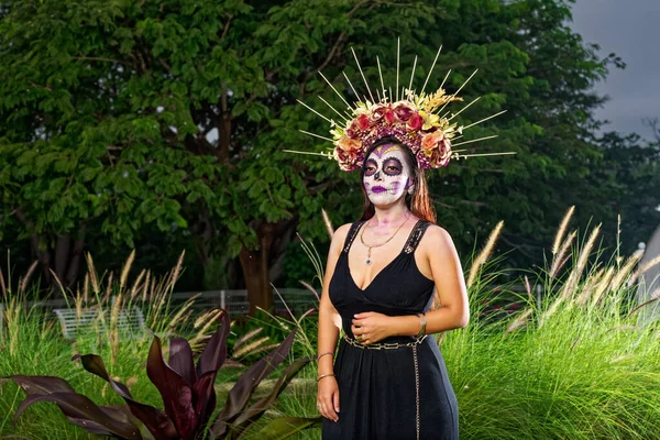 Young woman with sugar skull makeup. Day of The Dead. Catrina portrait.