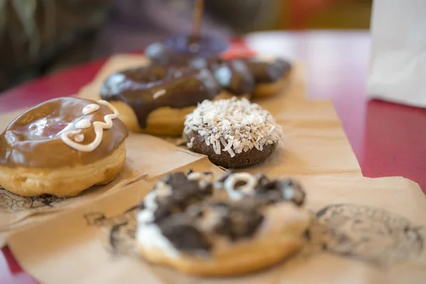 Colorful Tasty Chocolate Decorated Doughnuts Table — Stock Photo, Image