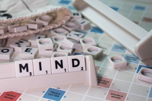 Closeup White Cubes Spelling Word Mind Board Game — Stock Photo, Image