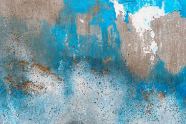 Beton duvar desenli mavi boyalı yakın plan bir fotoğraf.