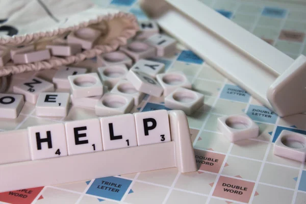 Closeup Word Help Spelling White Cubes Scrambling Board Game — Stock Photo, Image