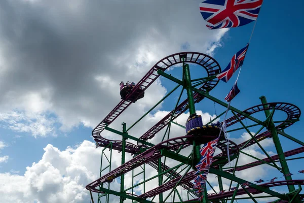 Fairground Ride Blue Sky Clouds Union Jack Flags — Stock Photo, Image