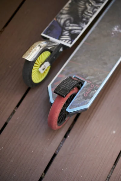 Vertical High Angle Closeup Two Child Scooters Wooden Surface Poznan — Stock Photo, Image