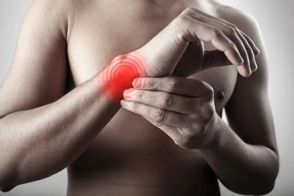 Close View Shirtless Fitness Man Holding Wrist Injury Zone Highlighted — Stock Photo, Image