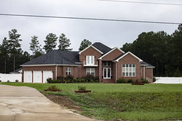 Burke County, Ga USA - 05 21 21: New Beautiful country brick charming southern home in the country