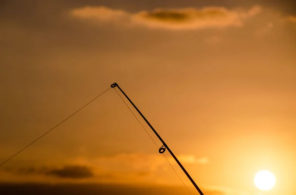Fiskare Fiske Spön Silhuett Vid Orange Sunset — Stockfoto